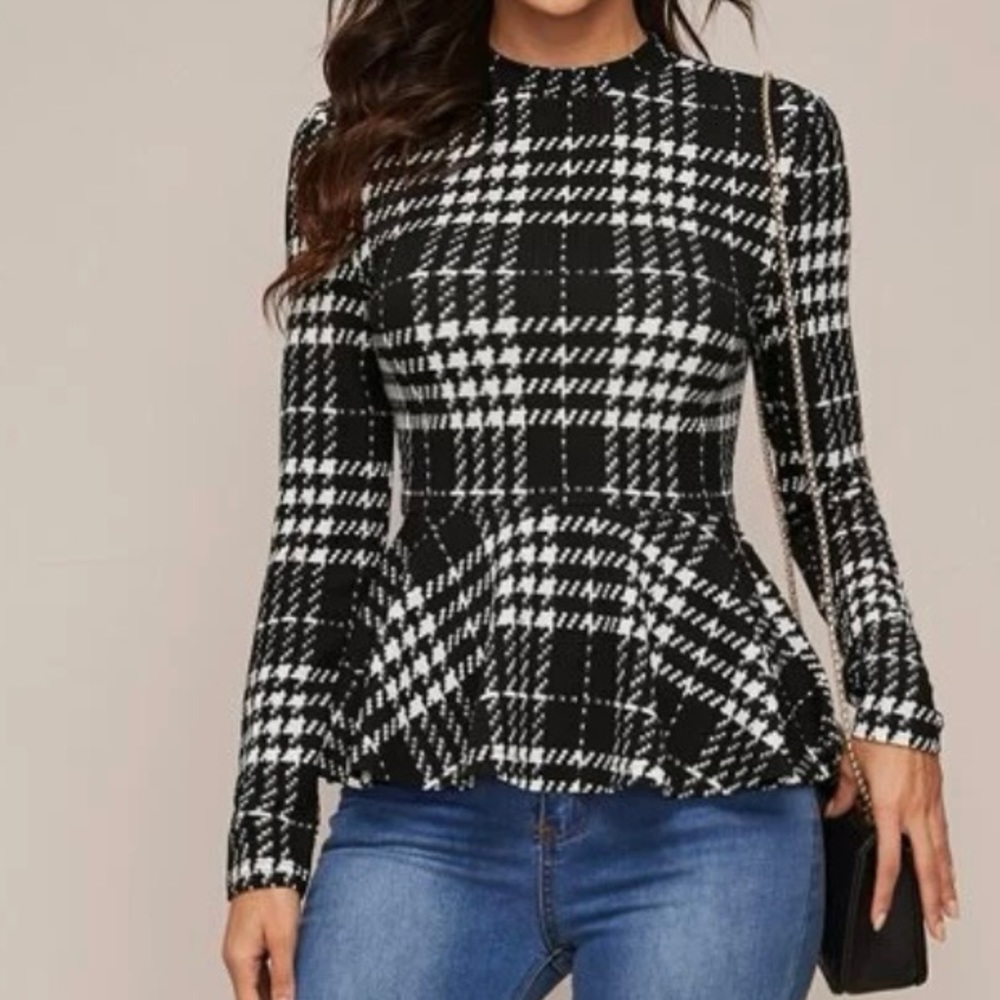 Long sleeve peplum top. Medium